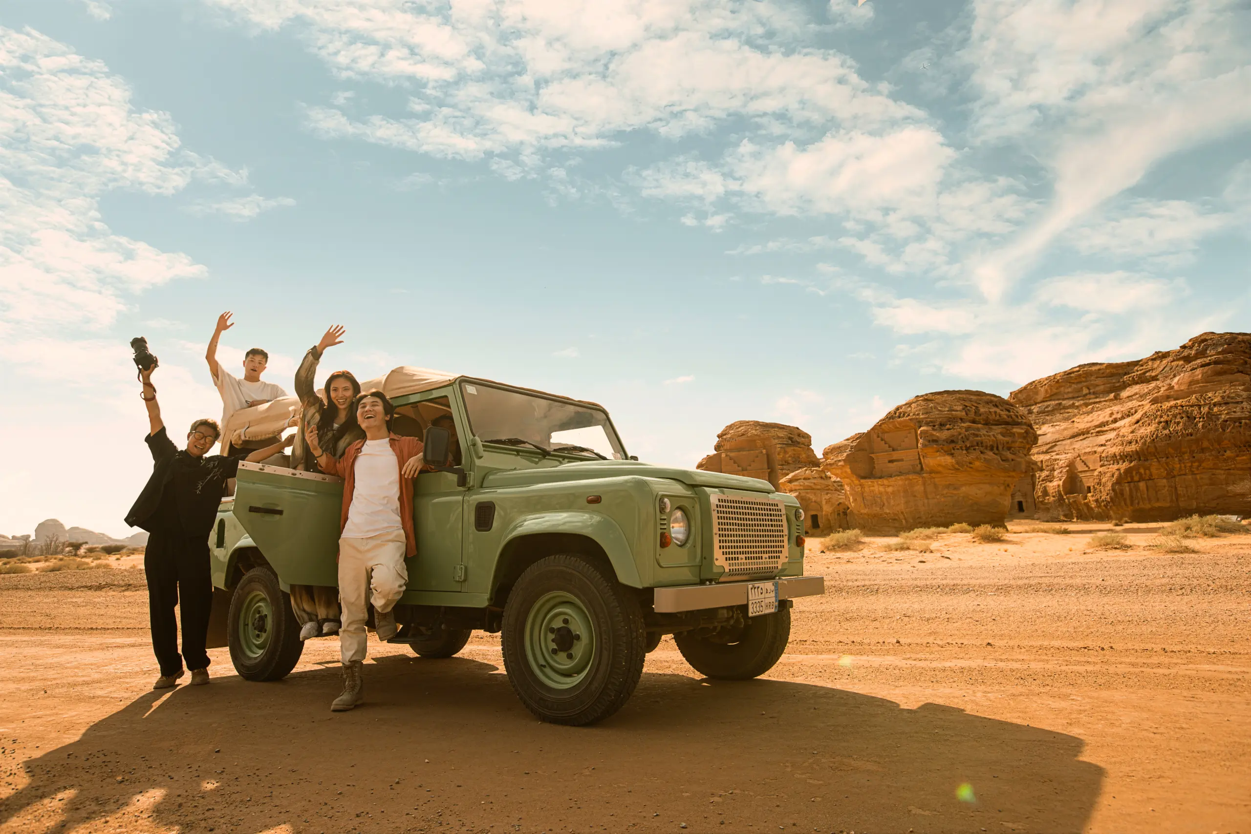 A group of people on a SUV drive