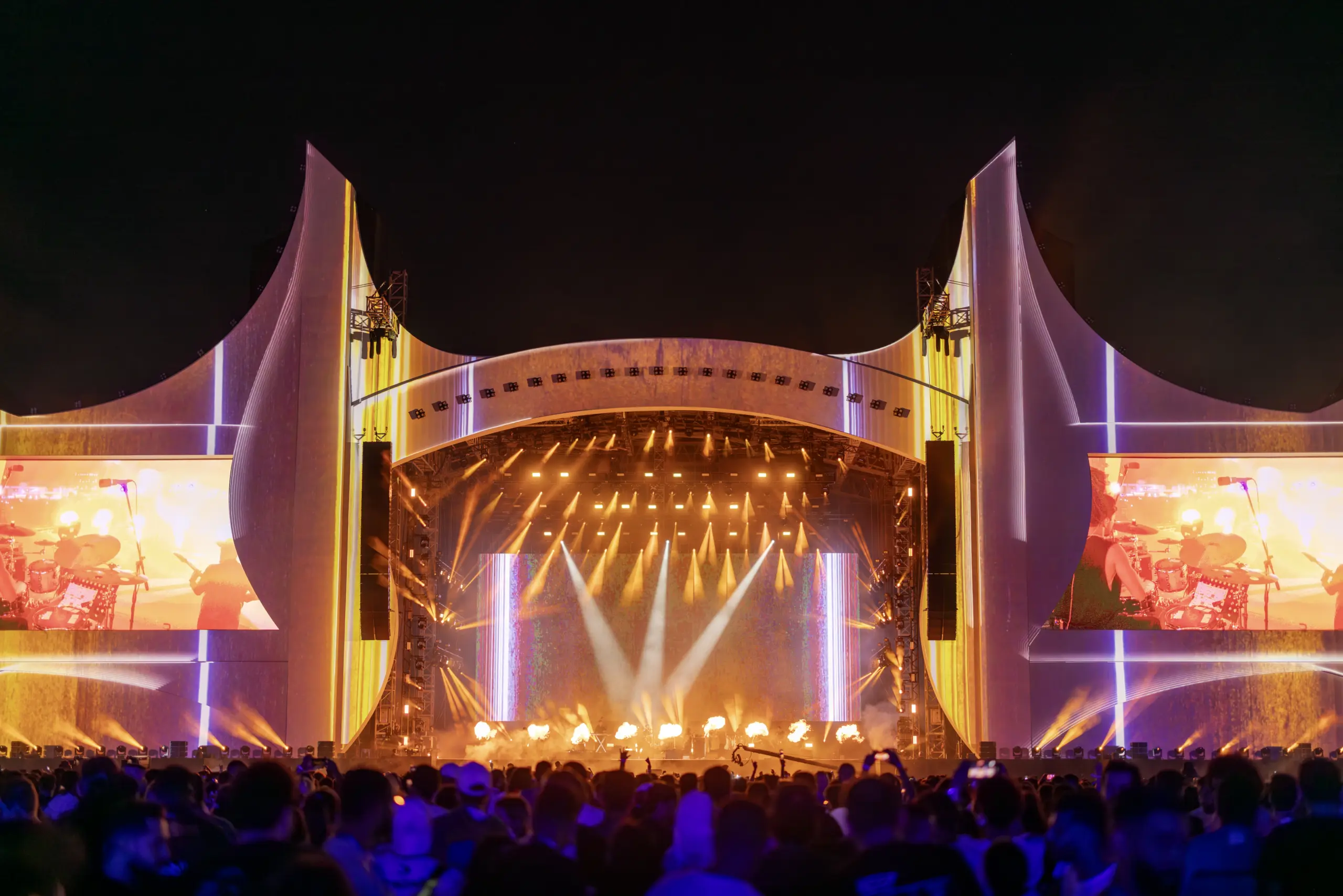 A live concert in Jeddah with bright stage lights